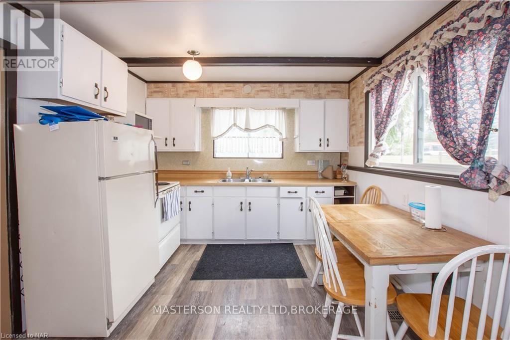 9208 Lundys Lane Lane, Niagara Falls (219 - Forestview), Ontario  L2H 0T5 - Photo 9 - X9410960