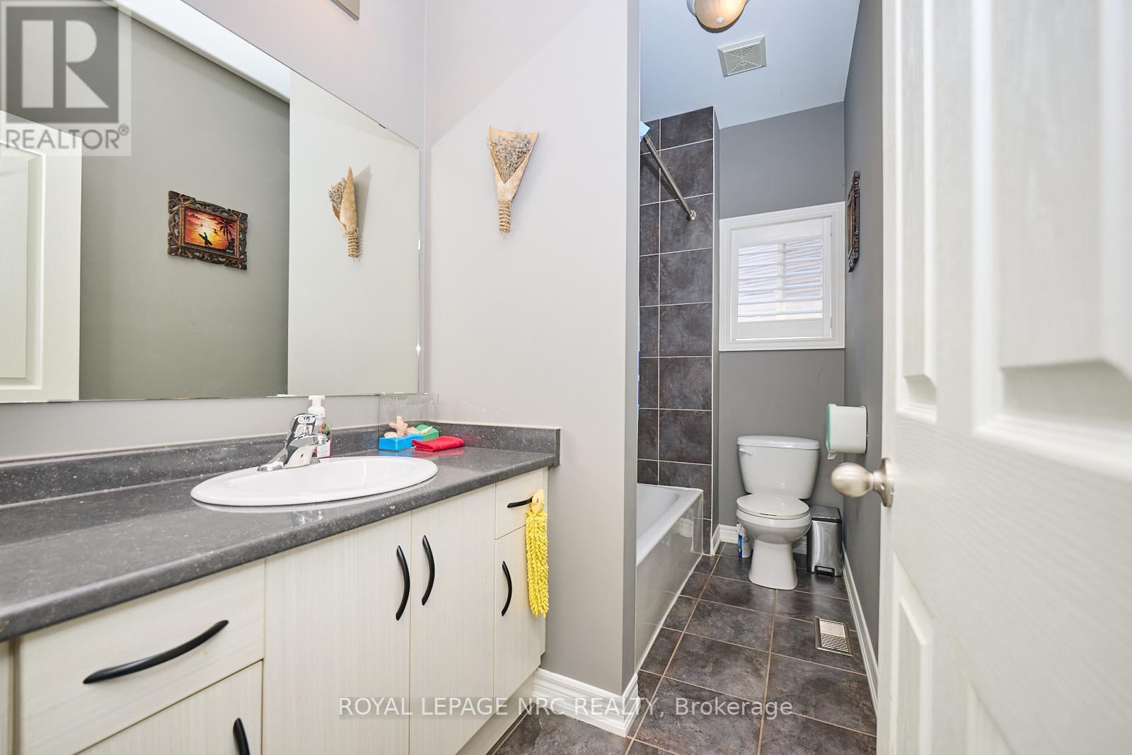 8913 Tallgrass Avenue, Niagara Falls (Lyons Creek), Ontario  L2G 0E6 - Photo 14 - X12104608