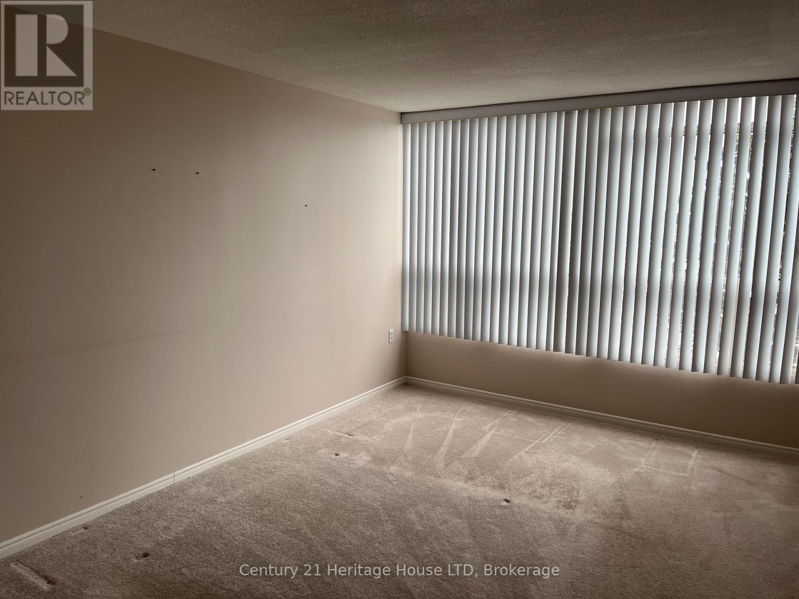 407 - 5100 Dorchester Road, Niagara Falls (Morrison), Ontario  L2E 7H4 - Photo 3 - X12003628