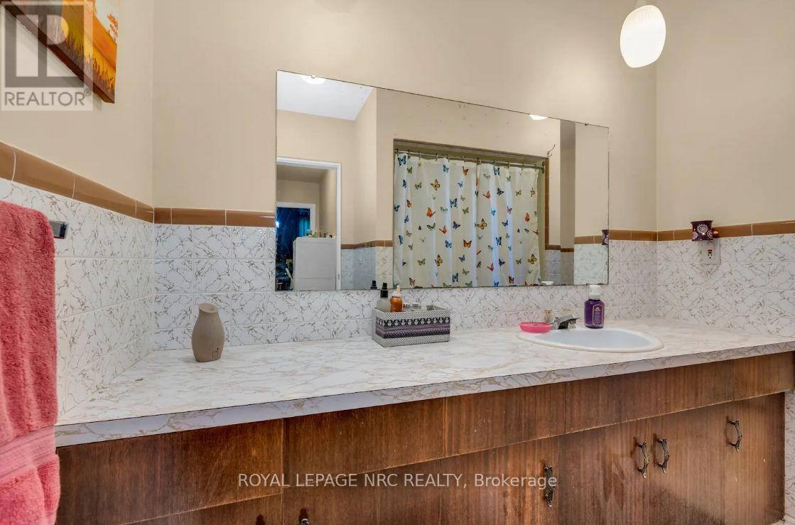 242 West Side Road, Port Colborne, Ontario  L3K 5K9 - Photo 9 - X12481229