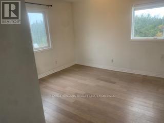 Upper Unit #1 - 33266 Pettit Road, Wainfleet, Ontario  L0S 1V0 - Photo 2 - X12524658